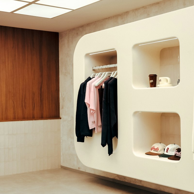 Bright, organized retail clothing store interior